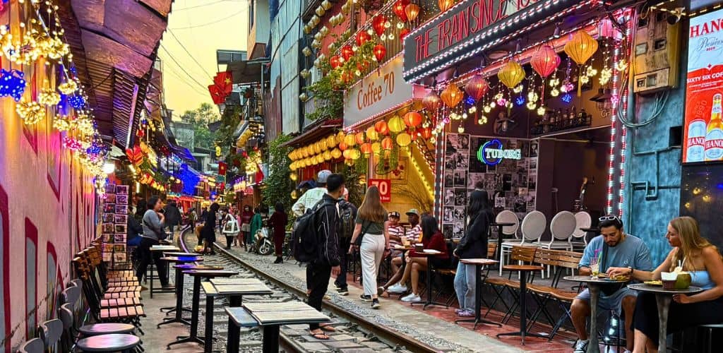 Colorful busy train street in Hanoi