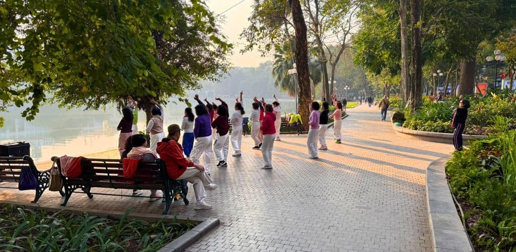 Path around the lake with a group of older women doing a dance class