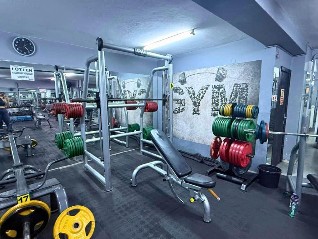 Smith machine, bench, and lots of large weights