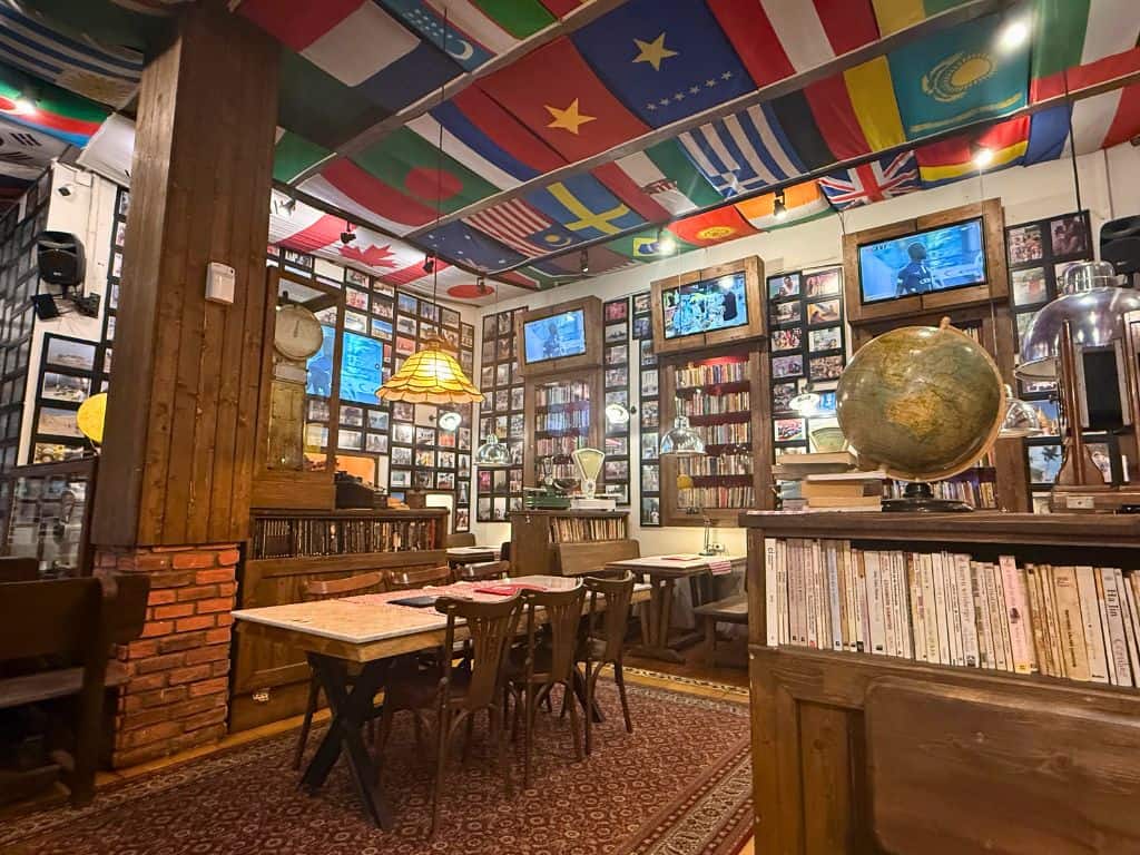 Cool cafe with lots of flags and books in Antalya, Turkiye