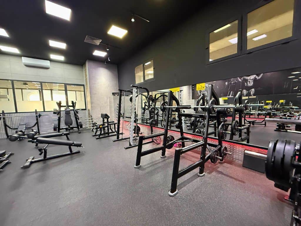 Heavy lifting equipment like free squat rack and smith machine