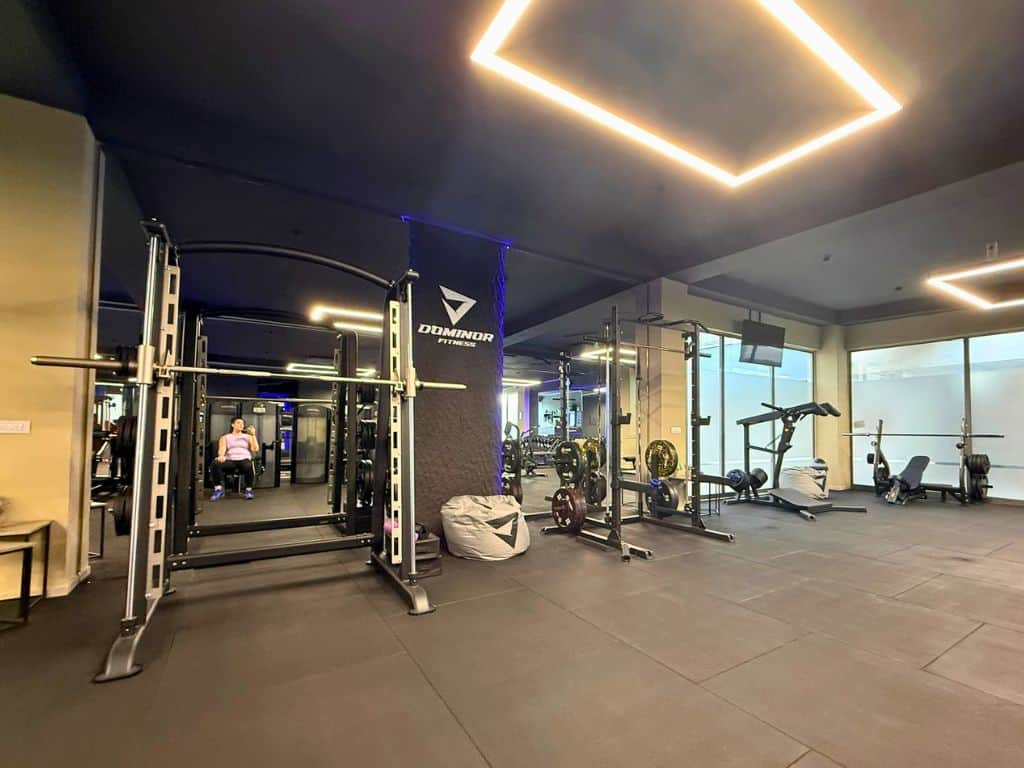 Two squat racks and incline bench press